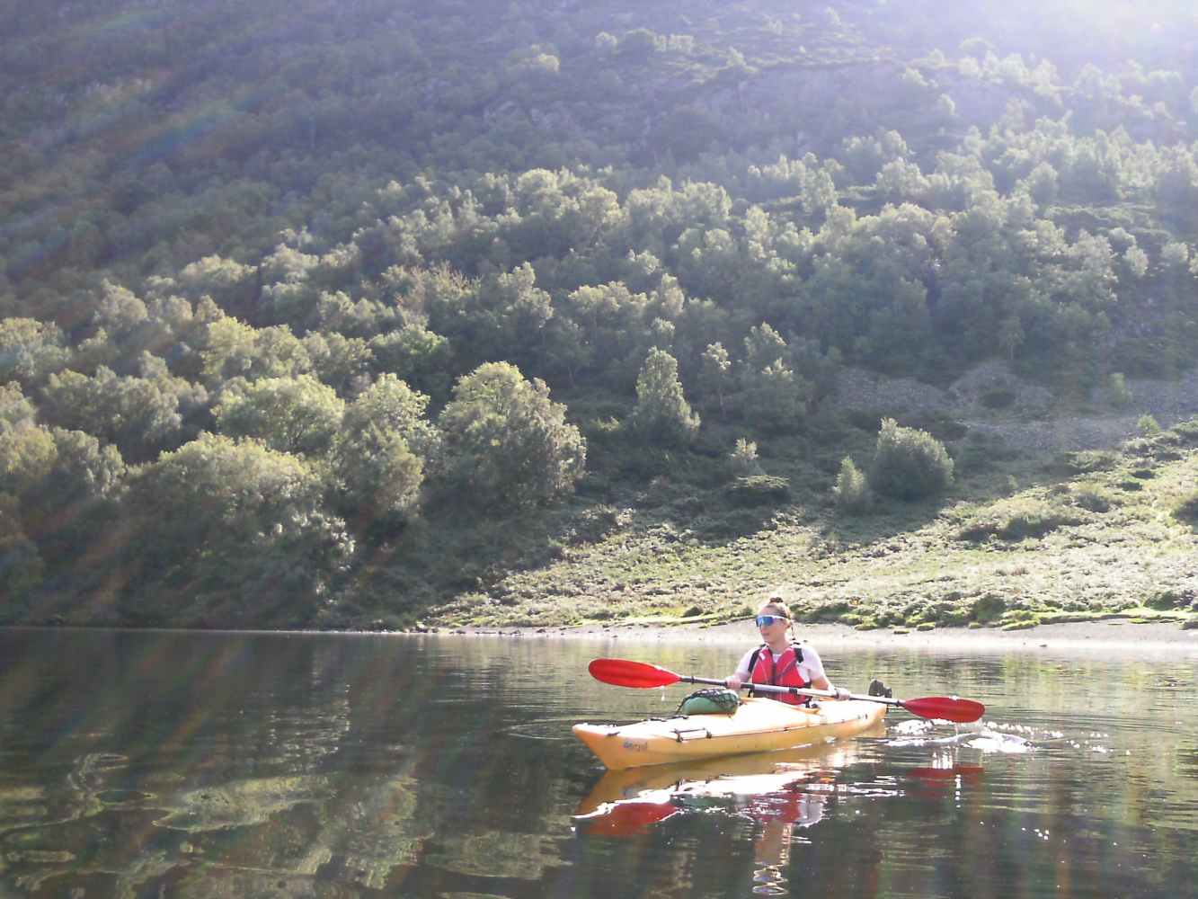 A guest enjoying a Lake District Kayak Adventure.