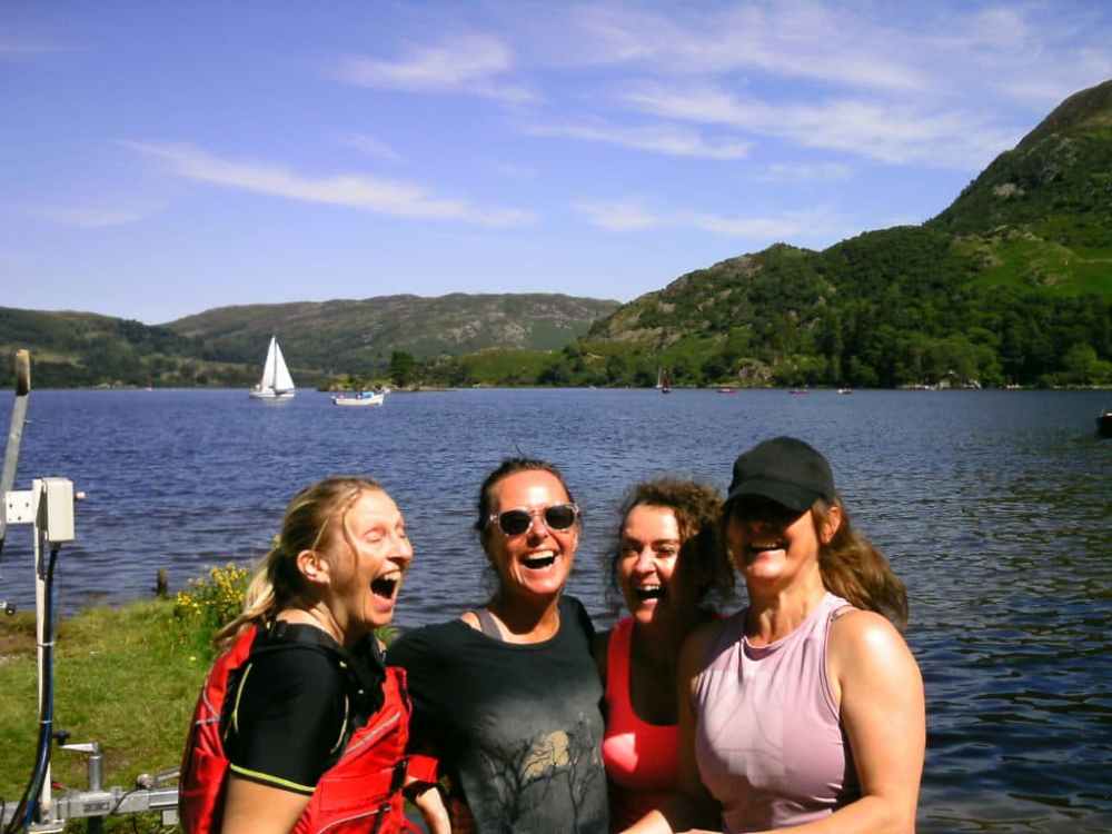 A group of friends having a fantastic time experiencing the beauty of Ullswater.